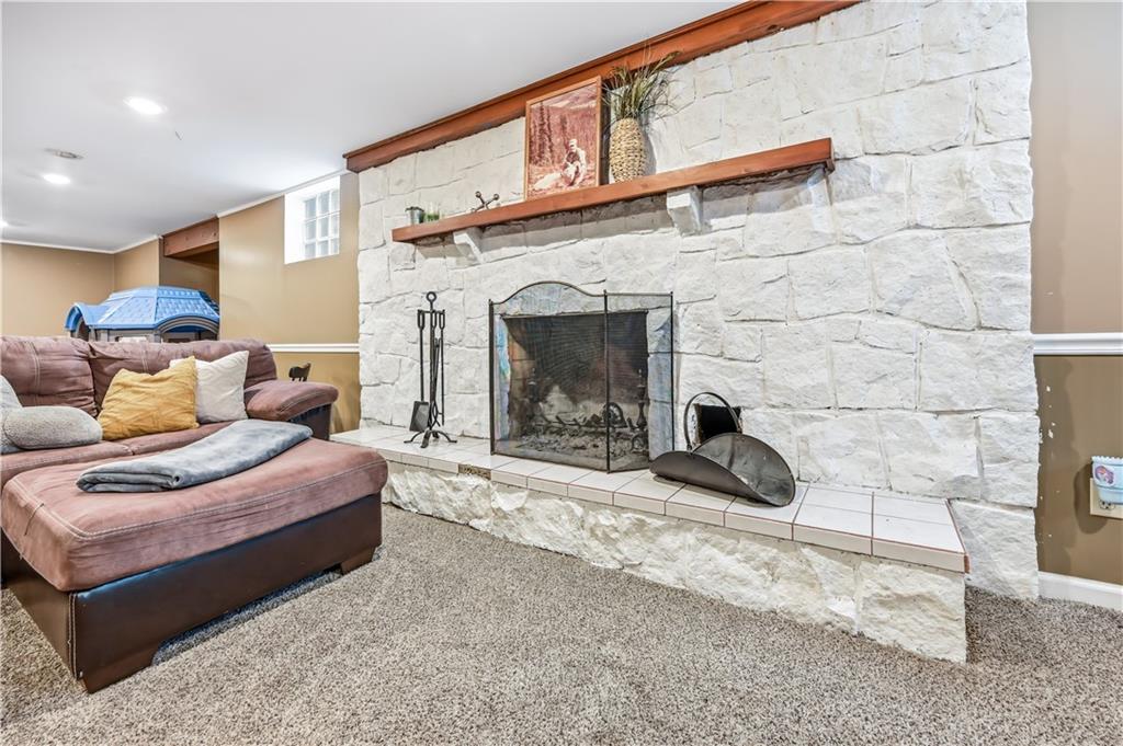 516 Wallace Run Road Darlington, PA 16115 - Photo 32 of 41 Wood burning fireplace in basement