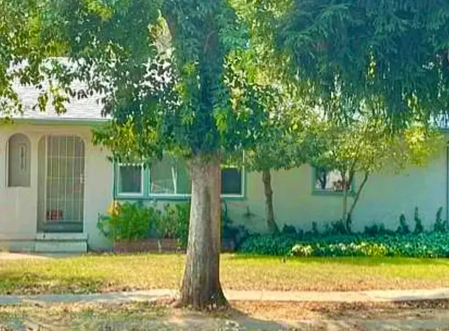 a view of a house with a swimming pool