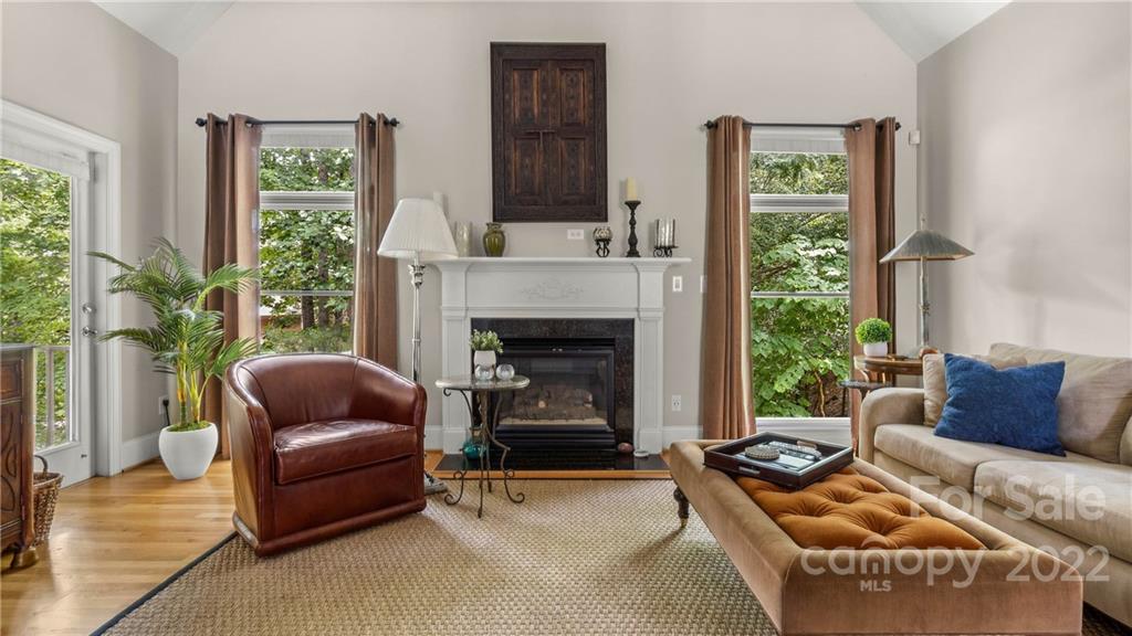 11147 Scullers Run Tega Cay, SC 29708 - Photo 12 of 39 a living room with furniture and a fireplace