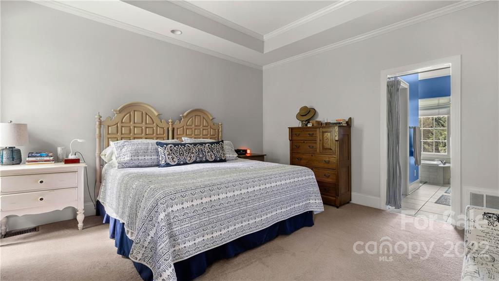 11147 Scullers Run Tega Cay, SC 29708 - Photo 14 of 39 a bedroom with a bed and window