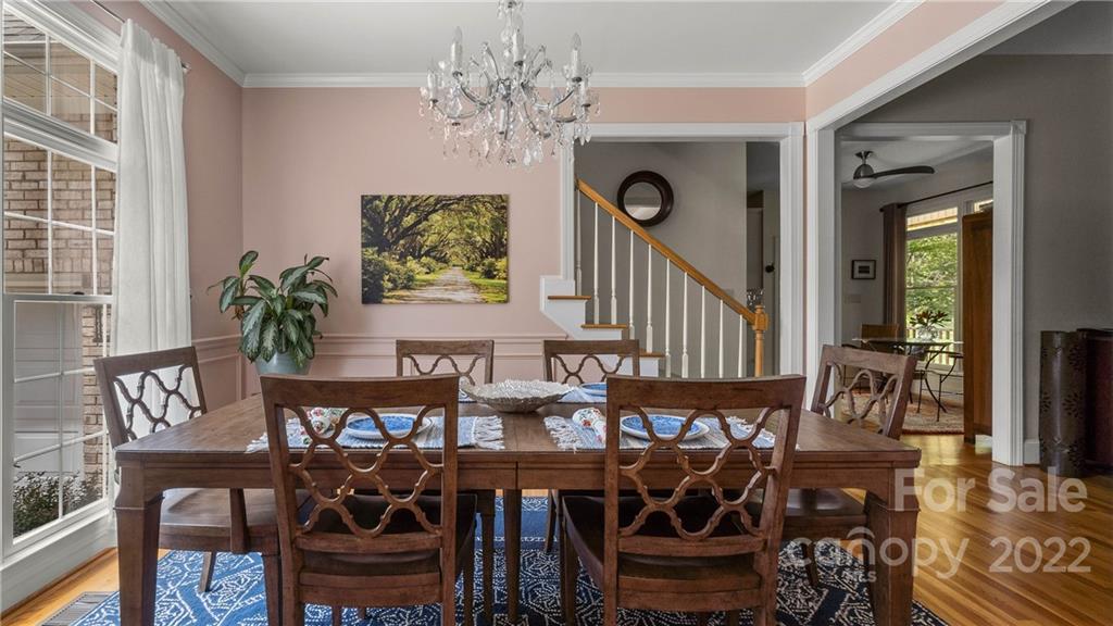 11147 Scullers Run Tega Cay, SC 29708 - Photo 7 of 39 a view of a dining room with furniture window and wooden floor
