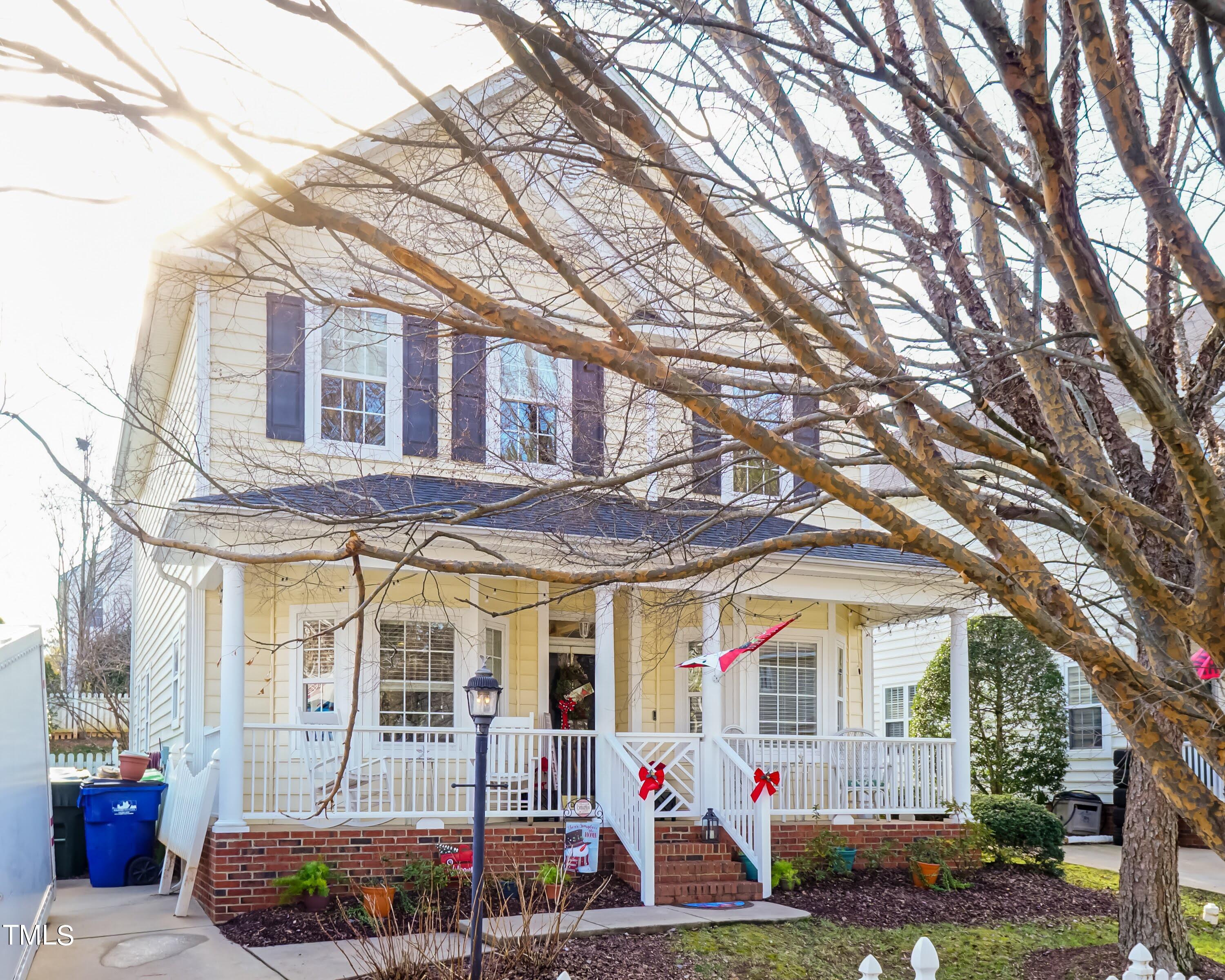5001 Morning Edge Drive Raleigh, NC 27613 - Photo 1 of 25 a front view of a building with retail shops