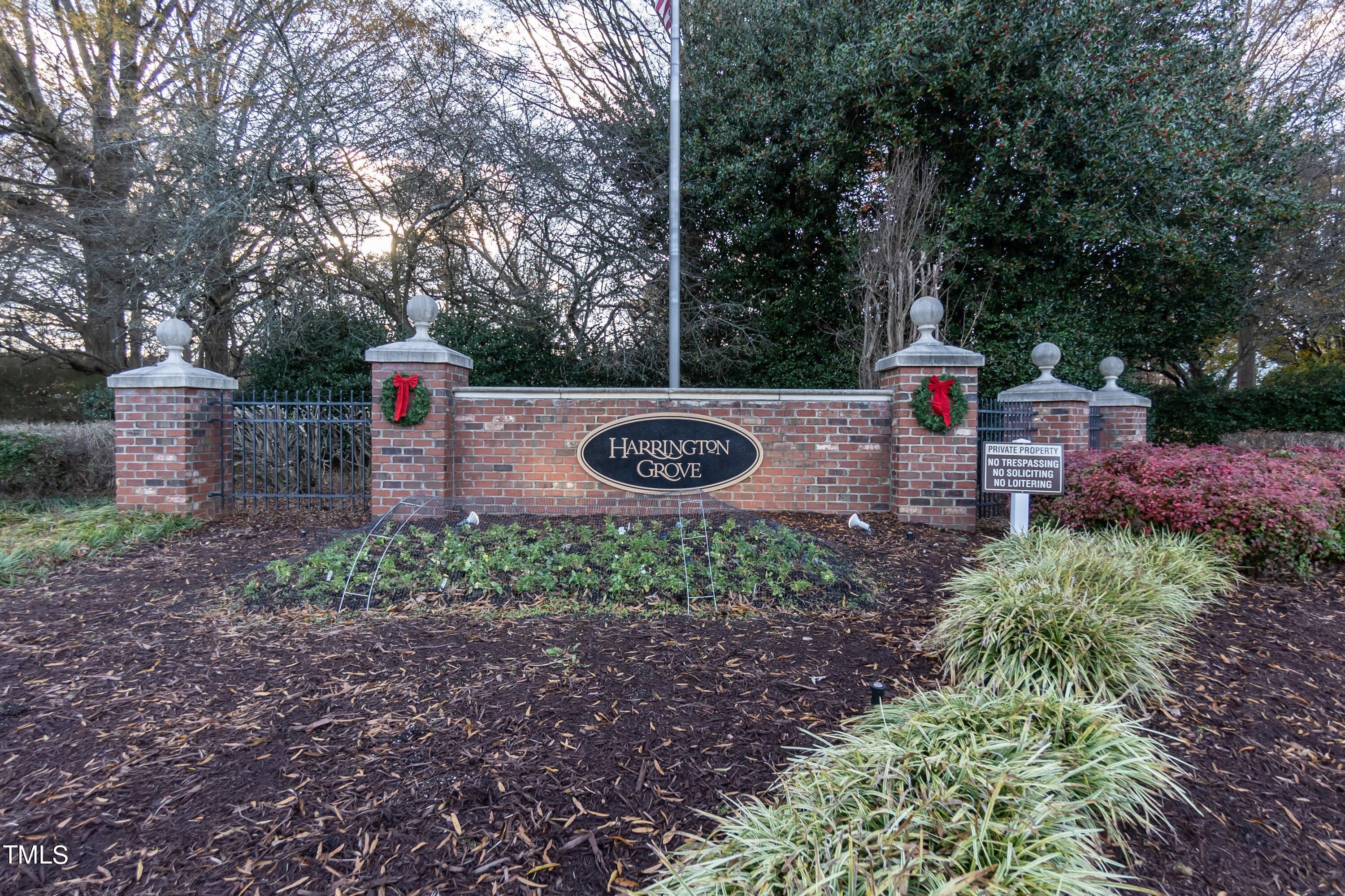 5001 Morning Edge Drive Raleigh, NC 27613 - Photo 25 of 25 a view of a park with large trees and wooden fence