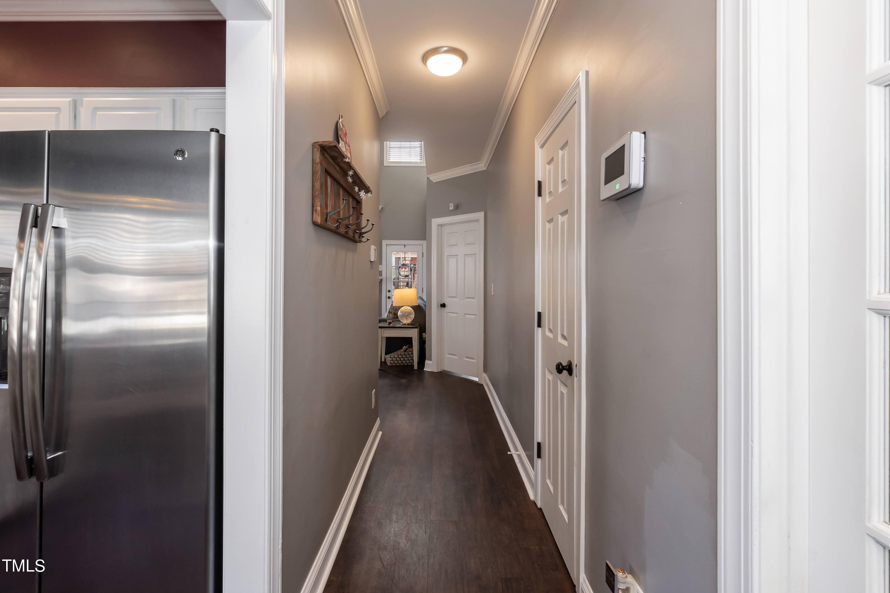 5001 Morning Edge Drive Raleigh, NC 27613 - Photo 5 of 25 a view of a hallway
