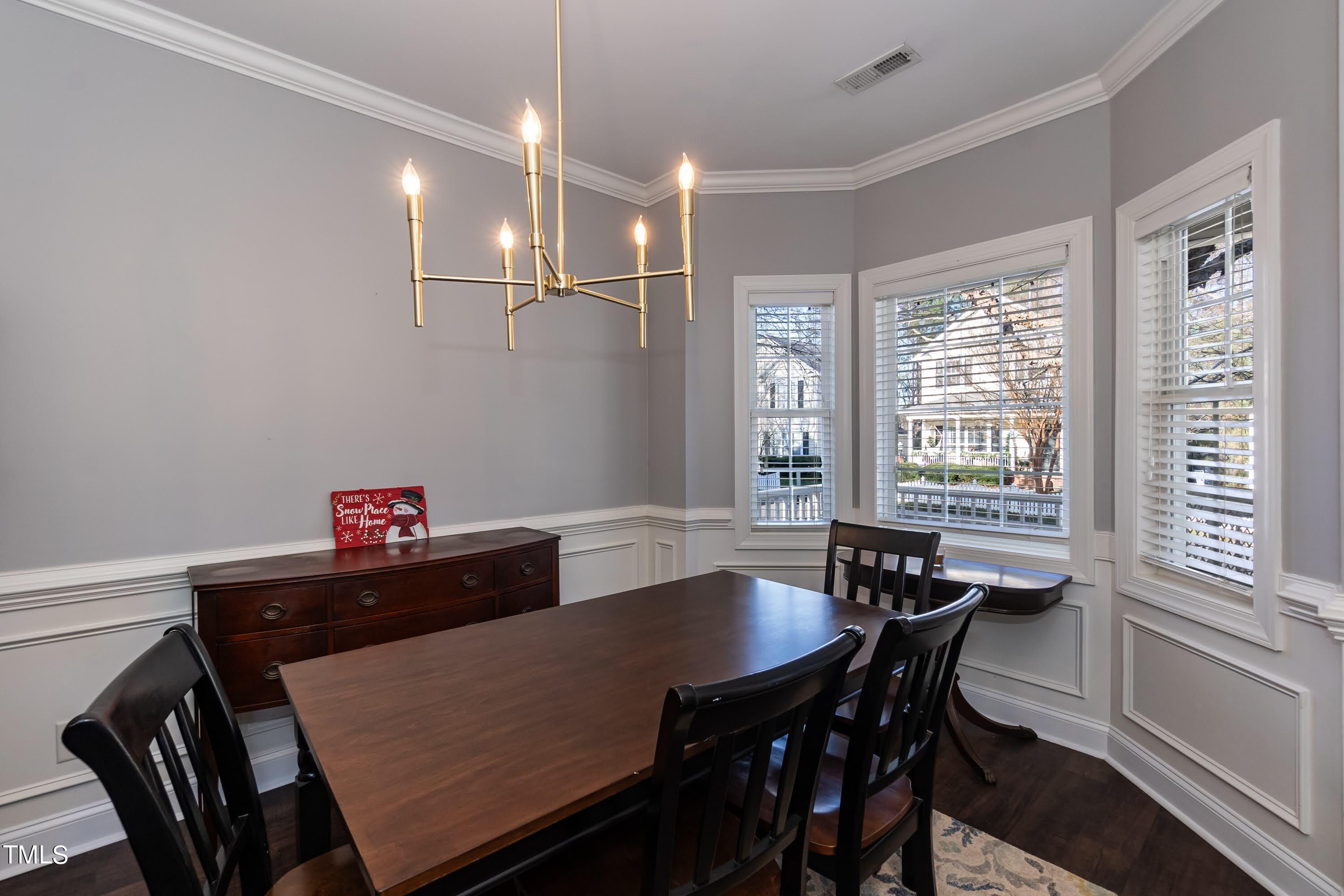 5001 Morning Edge Drive Raleigh, NC 27613 - Photo 10 of 25 a dining room with furniture and window