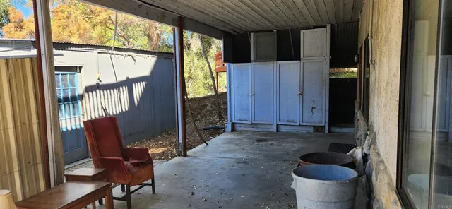a living room with furniture and a gate
