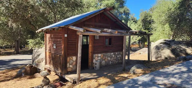 a view of a house with a yard and garage