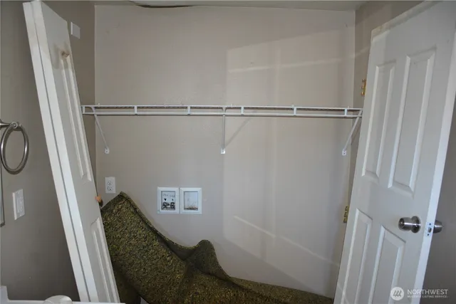 a bathroom with a shower and a sink