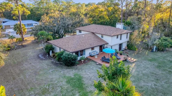 a vase of flowers sitting on a table