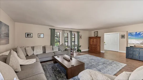 a living room with furniture and a couch