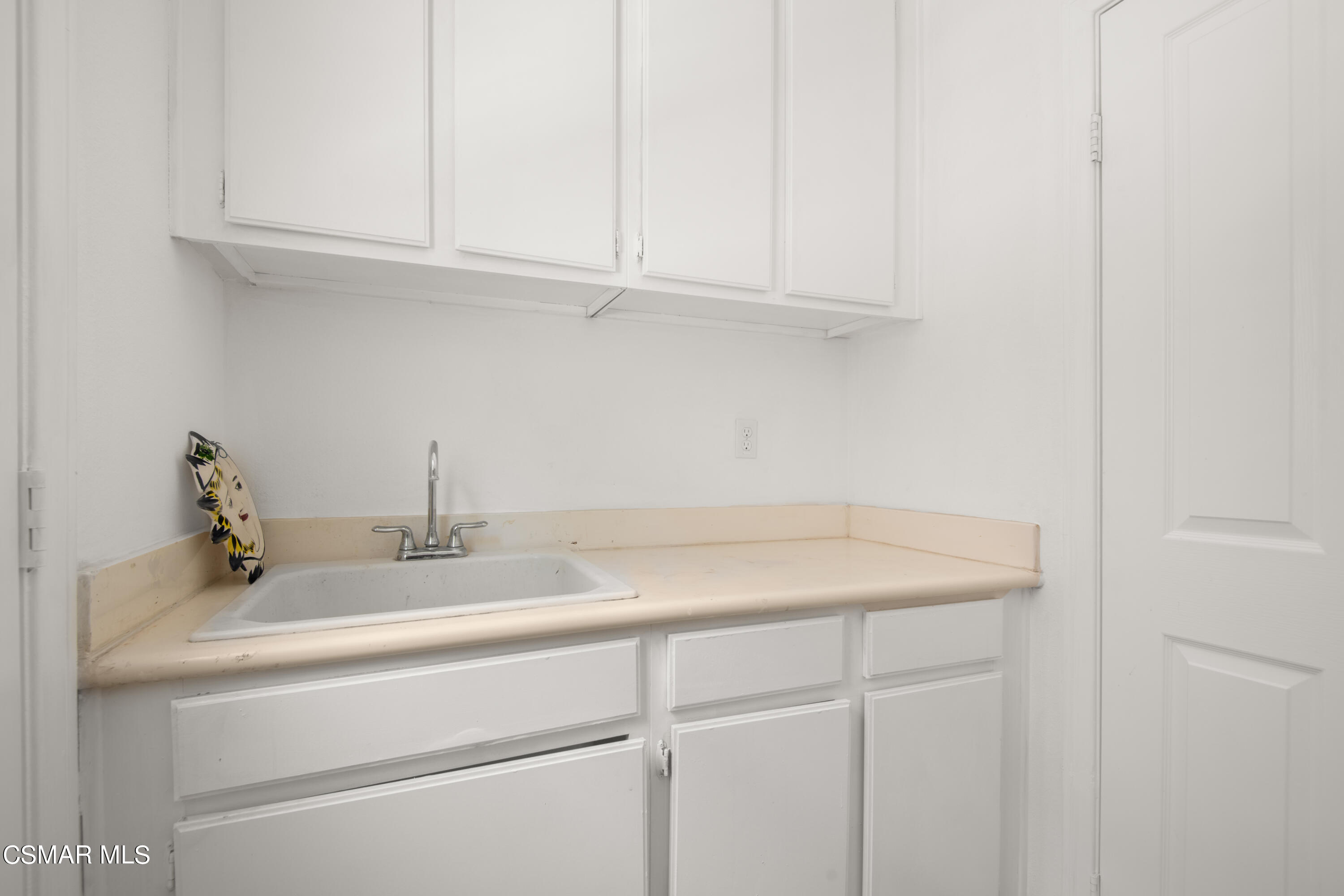 32645 The Old Road Castaic, CA 91384 - Photo 12 of 32 a bathroom with a sink and cabinets