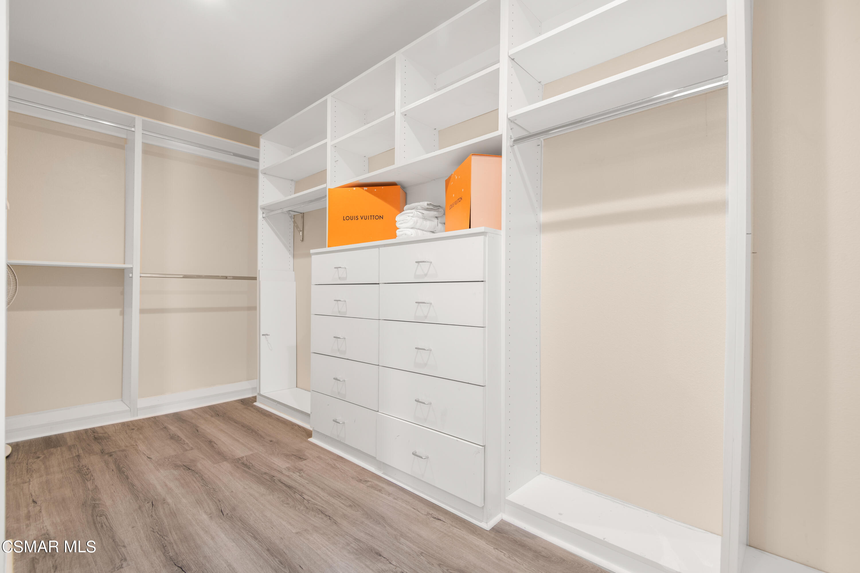 32645 The Old Road Castaic, CA 91384 - Photo 21 of 32 a view of walk in closet with empty racks