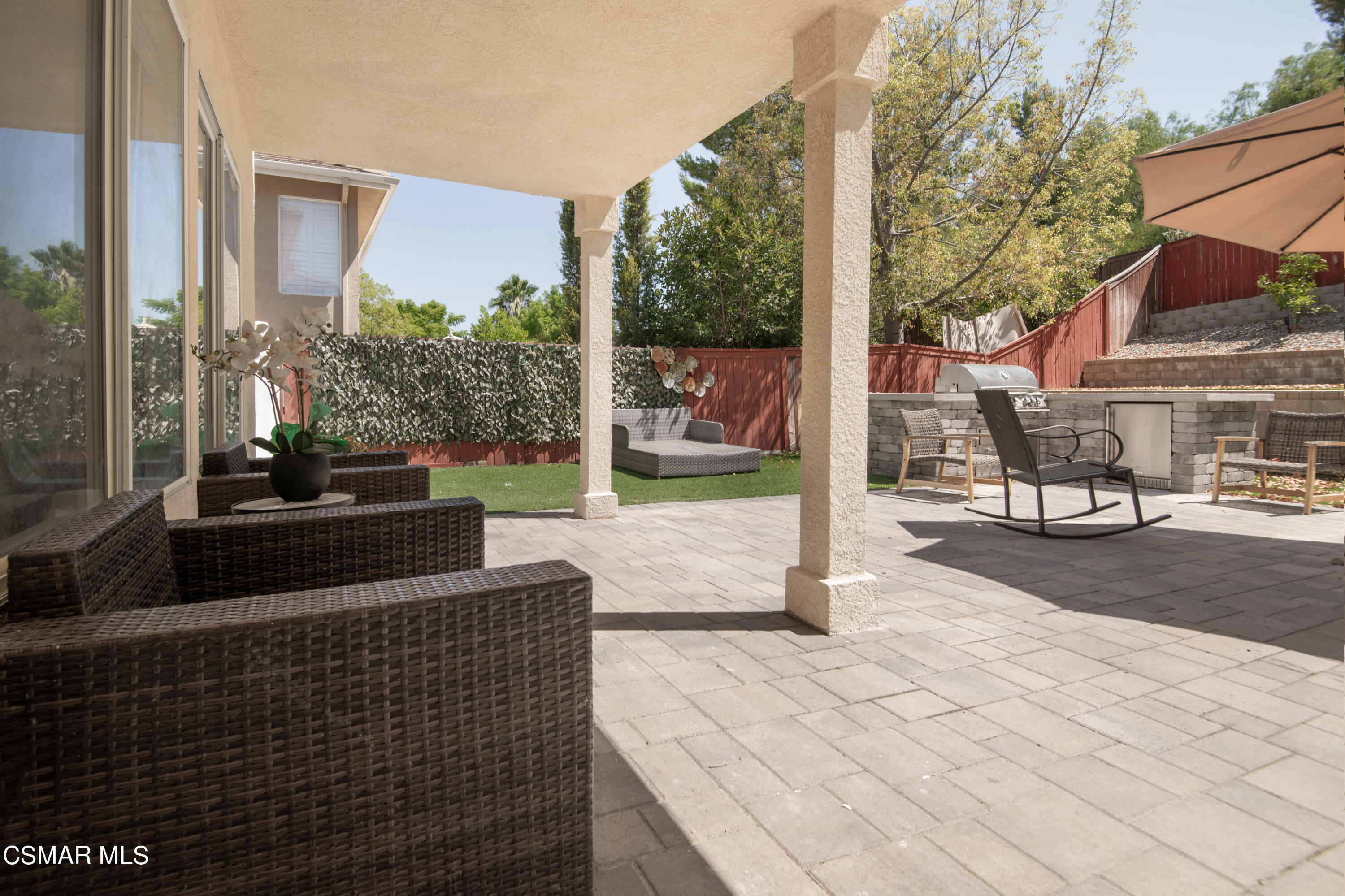32645 The Old Road Castaic, CA 91384 - Photo 30 of 32 a view of a patio with a table and chairs