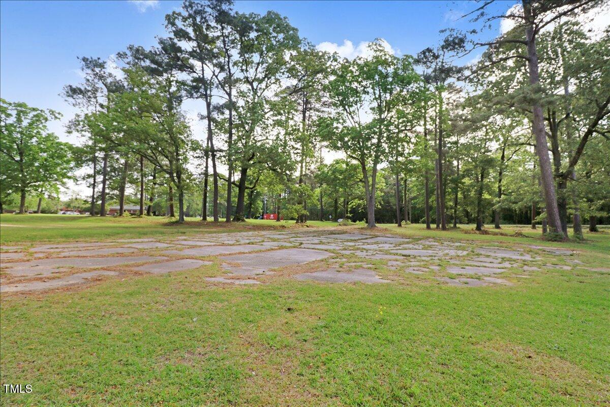 0 Country Club Road Smithfield, NC 27577 - Photo 16 of 24 a view of outdoor space with deck and trees