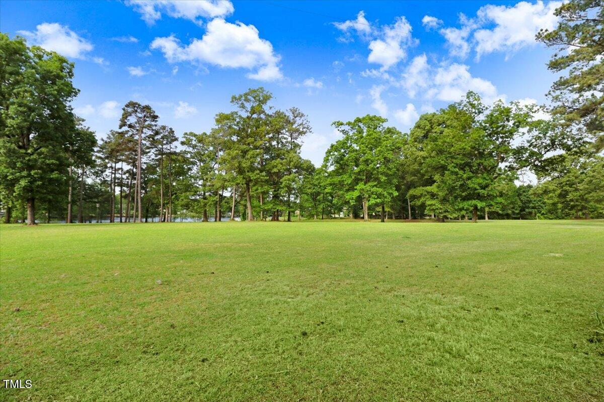 0 Country Club Road Smithfield, NC 27577 - Photo 19 of 24 a view of outdoor space with deck and yard