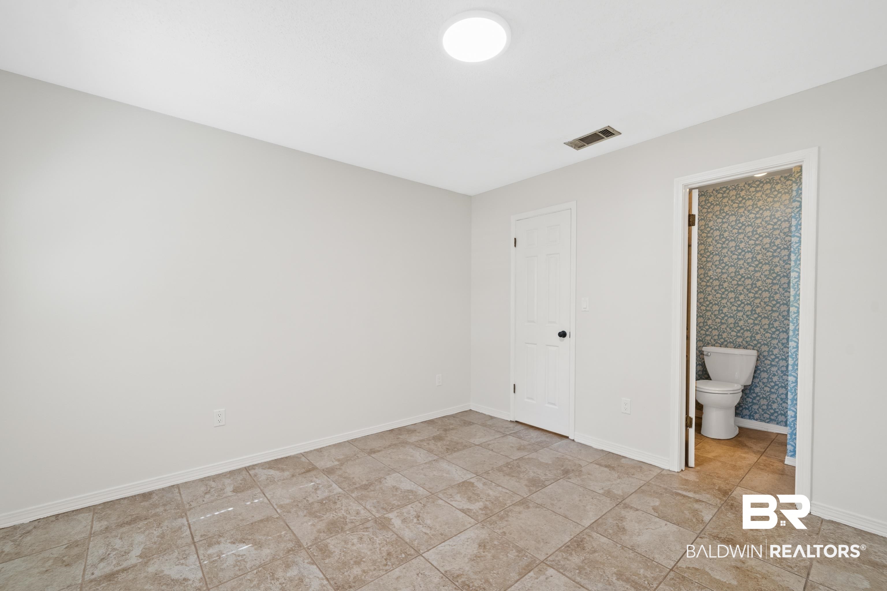 306 Liberty Street Fairhope, AL 36532 - Photo 21 of 32 Featuring full ensuite bathroom.