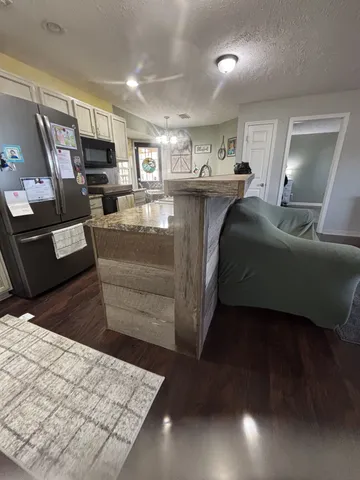 a view of a chair in a patio