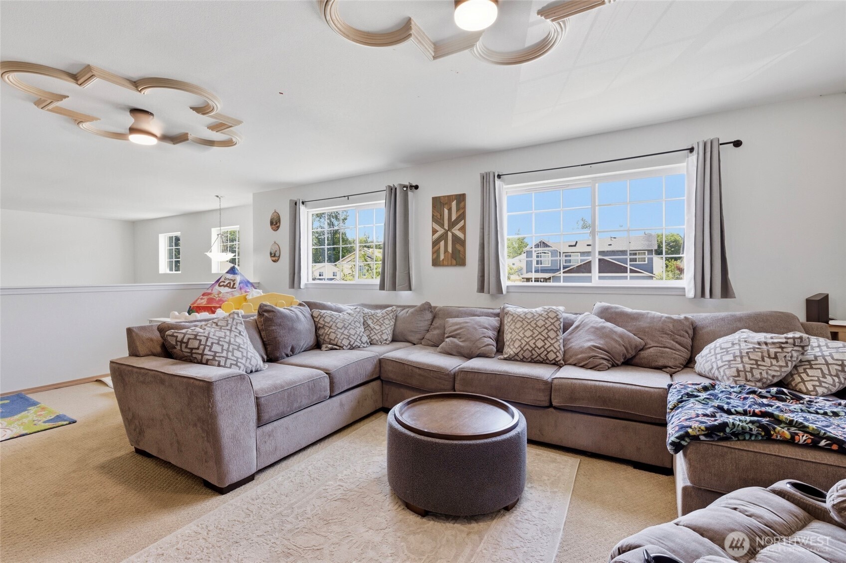 14005 Cedar Court Sultan, WA 98294 - Photo 14 of 38 a living room with furniture and a large window