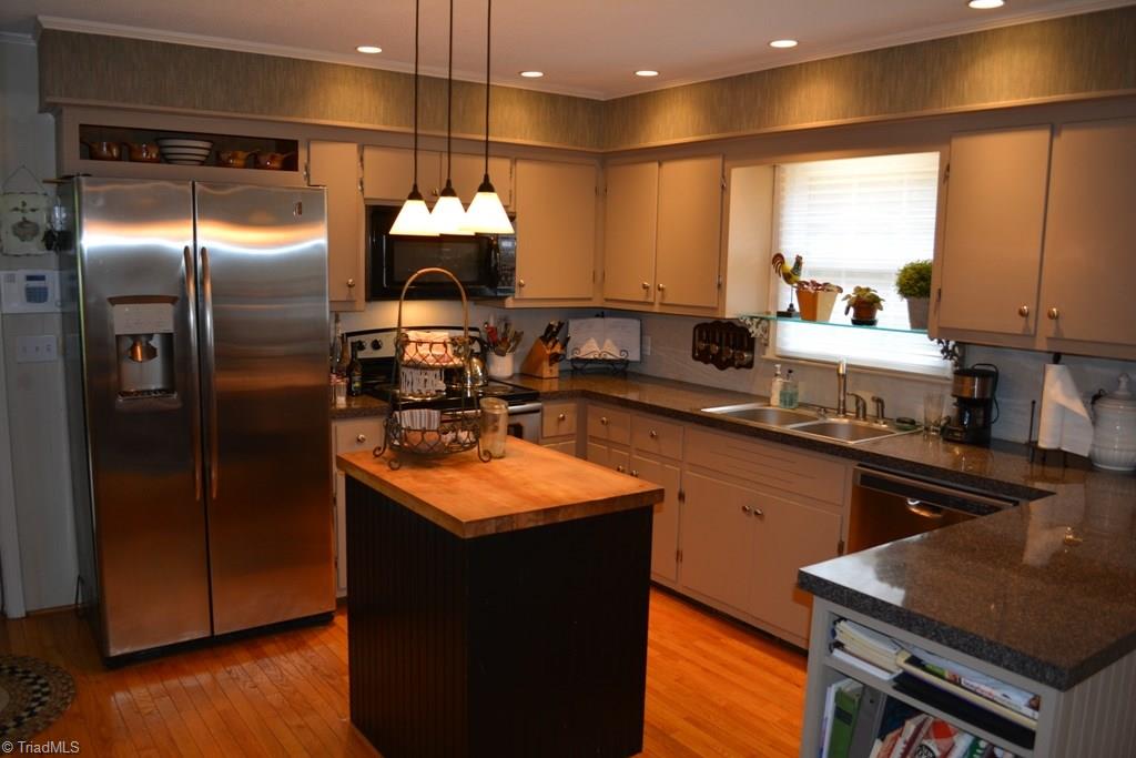 2582 Little Elkin Church Road Ronda, NC 28670 - Photo 5 of 30 Additional kitchen view. Notice the recessed lights and pendants over island