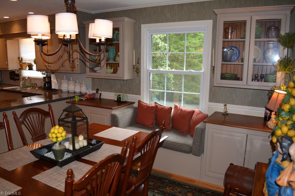 2582 Little Elkin Church Road Ronda, NC 28670 - Photo 7 of 30 The window seat in the dining area is a great place to relax, read, or simply enjoy the view of the manicured back yard