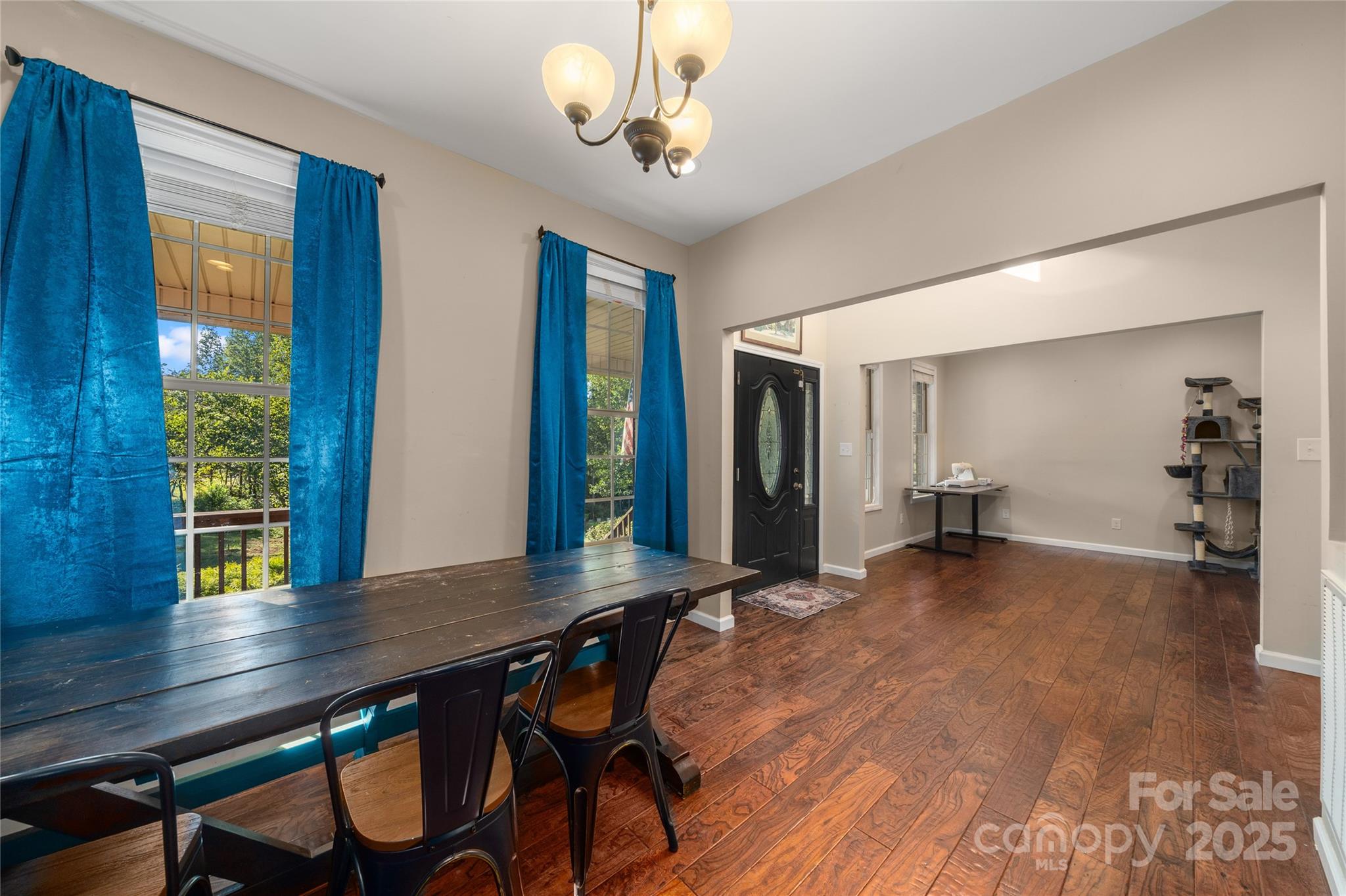 2341 Enola Road Morganton, NC 28655 - Photo 12 of 48 a view of a dining room with furniture and wooden floor