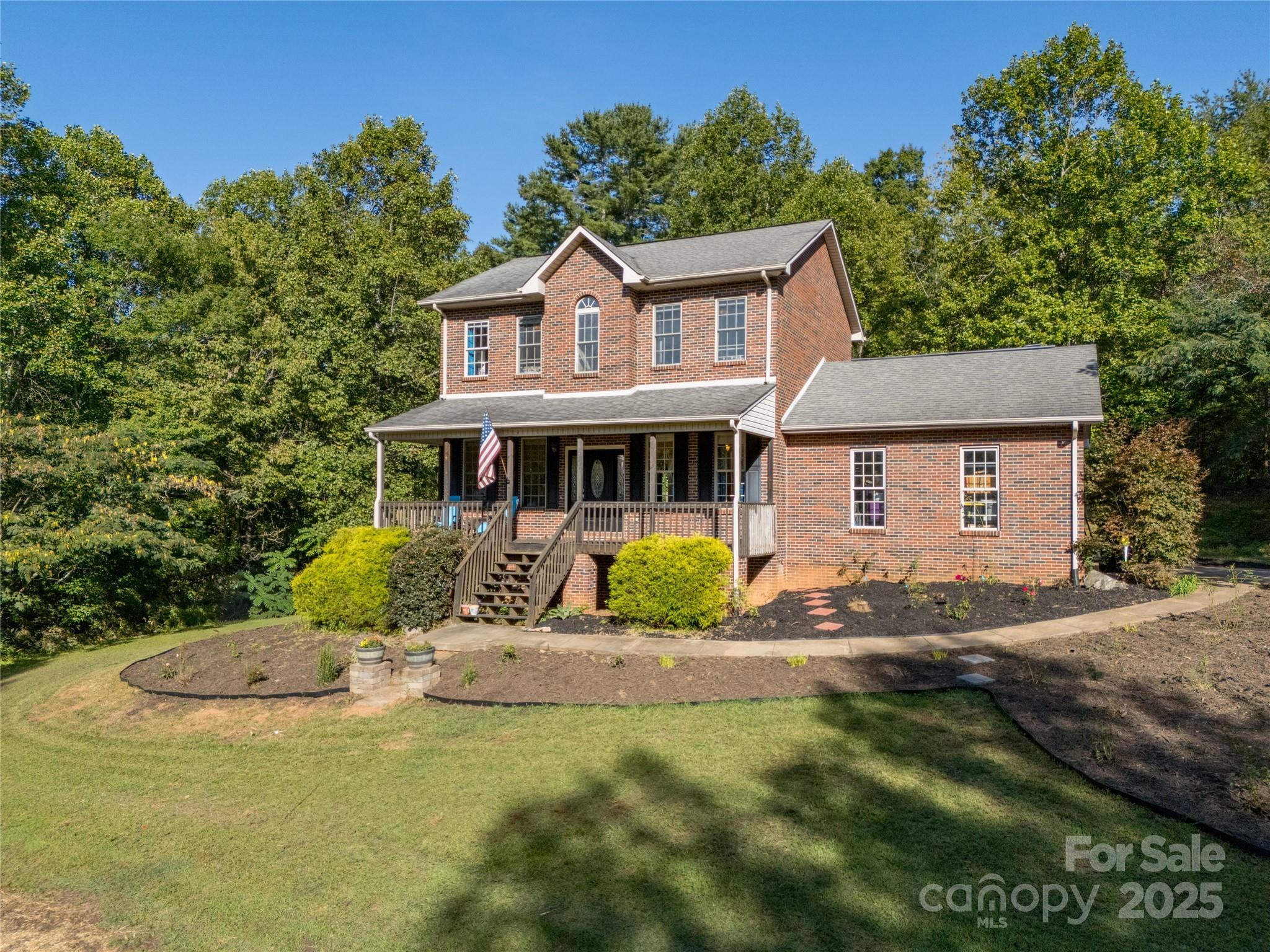 2341 Enola Road Morganton, NC 28655 - Photo 4 of 48 a front view of a house with a yard