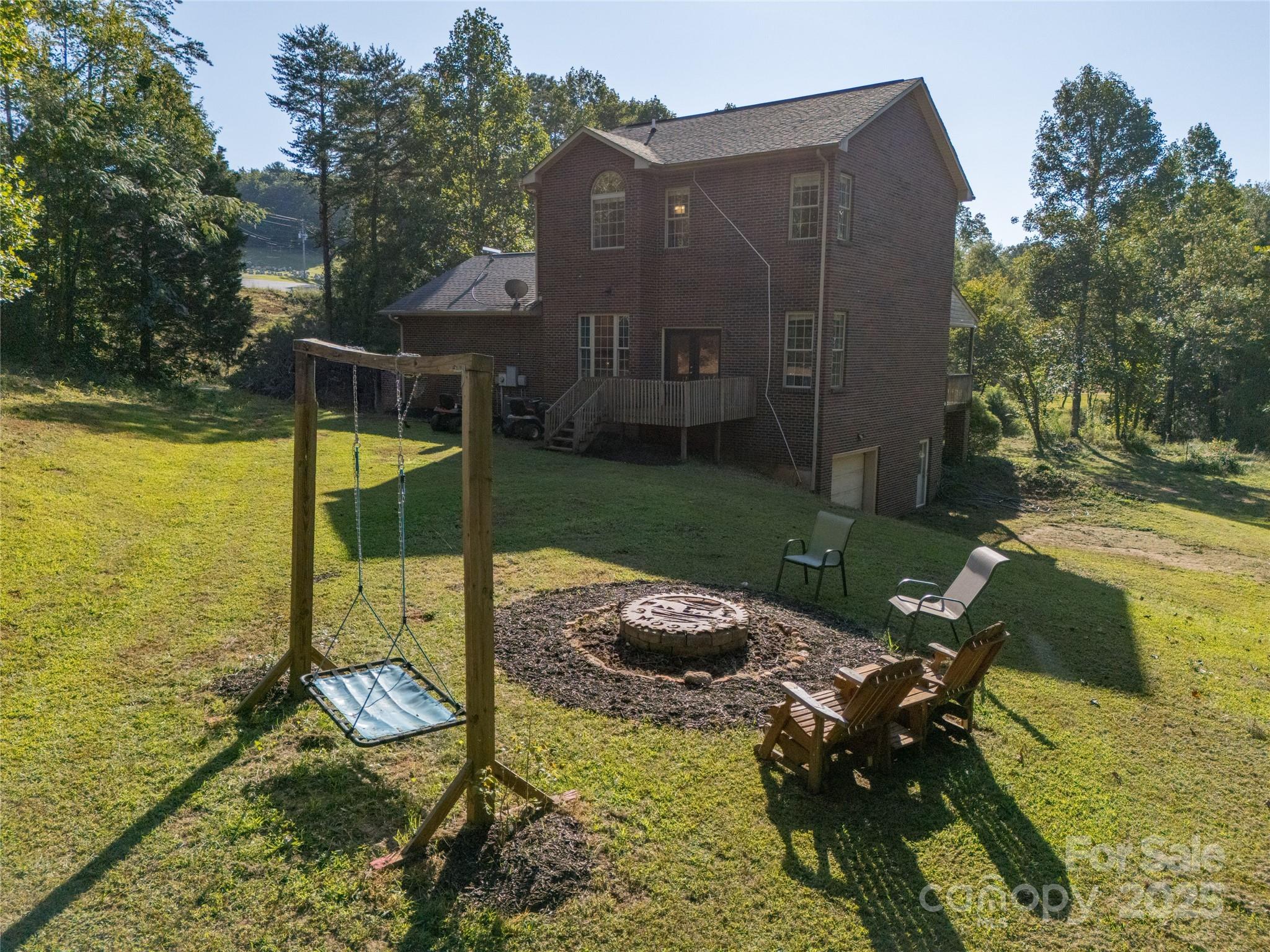 2341 Enola Road Morganton, NC 28655 - Photo 45 of 48 a view of a swimming pool with a lounge chairs
