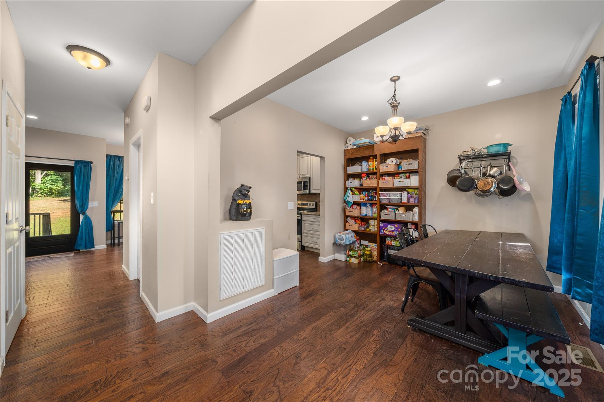 2341 Enola Road Morganton, NC 28655 - Photo 6 of 48 a view of a livingroom with furniture and wooden floor