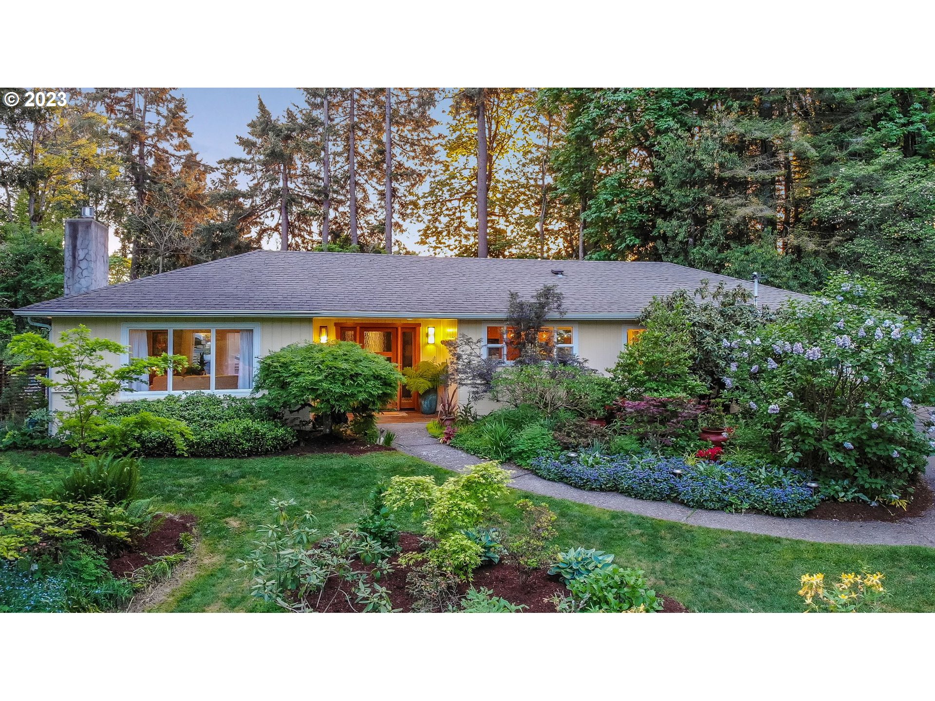 a black and white photo of a house