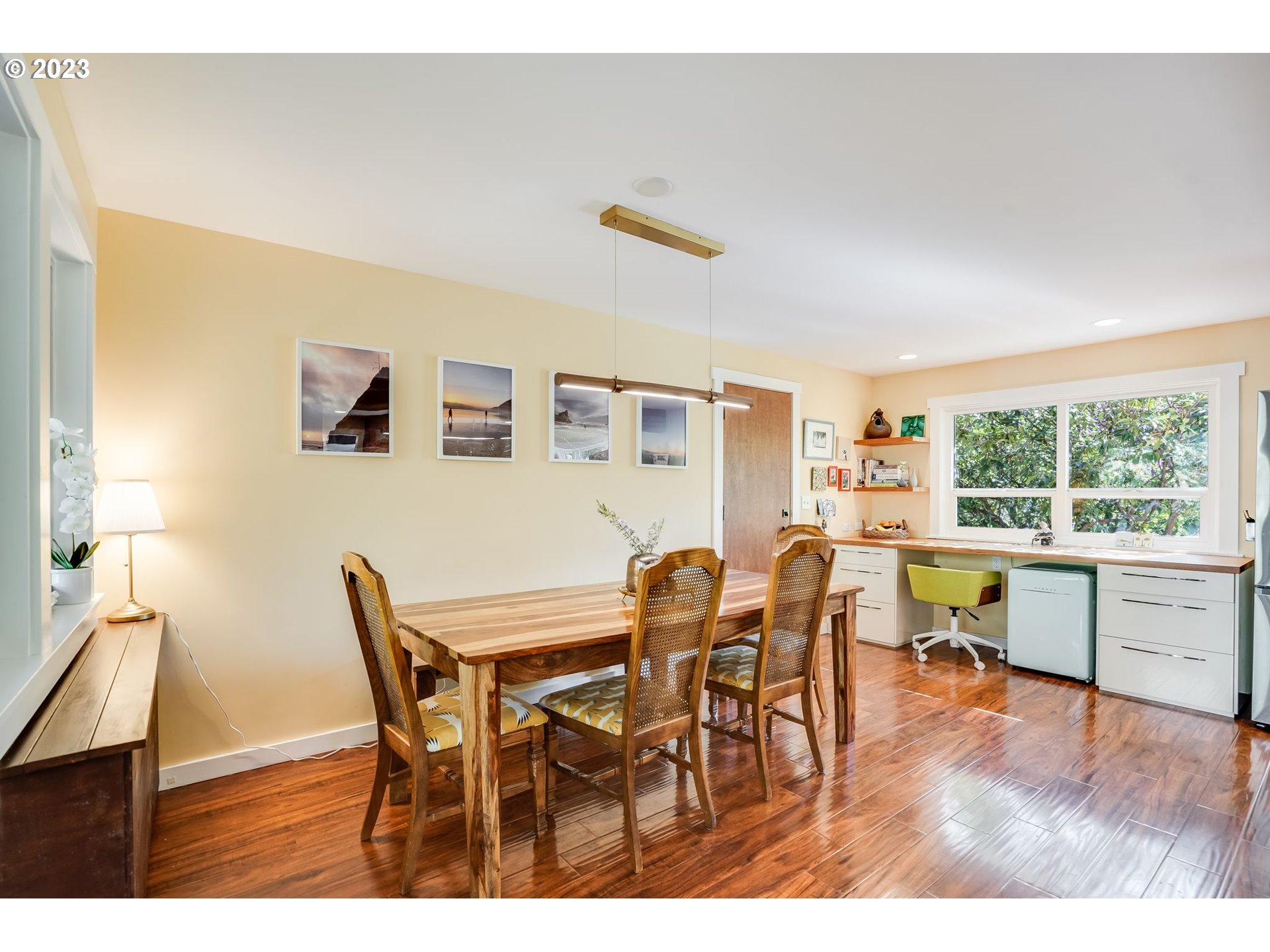644 South Palatine Hill Road Portland, OR 97219 - Photo 14 of 46 a view of a dining room with furniture and a wooden floor