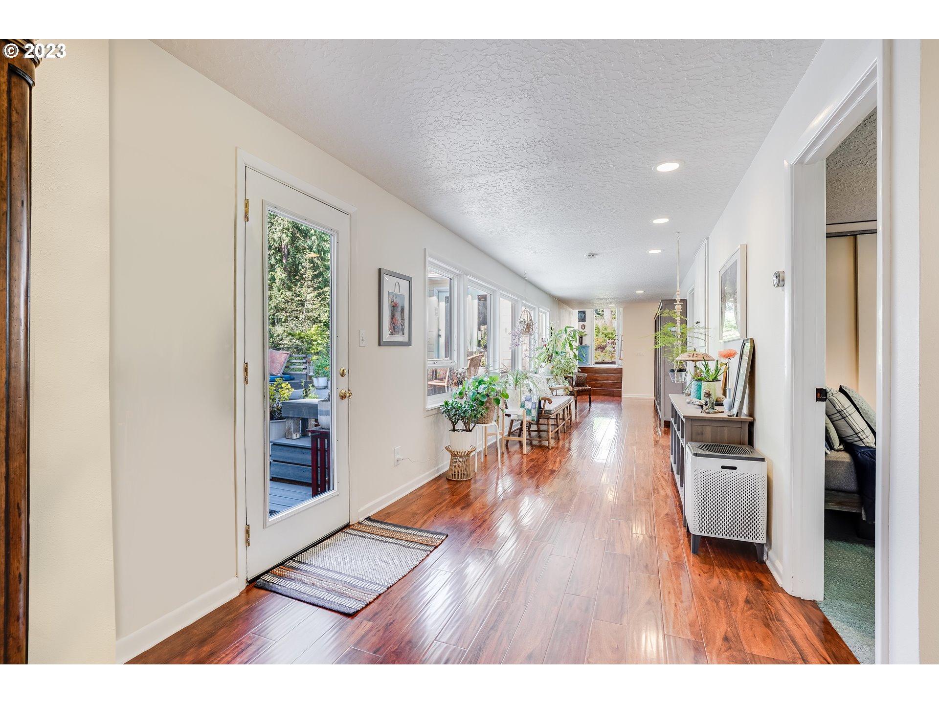 644 South Palatine Hill Road Portland, OR 97219 - Photo 16 of 46 a living room with furniture and a wooden floor