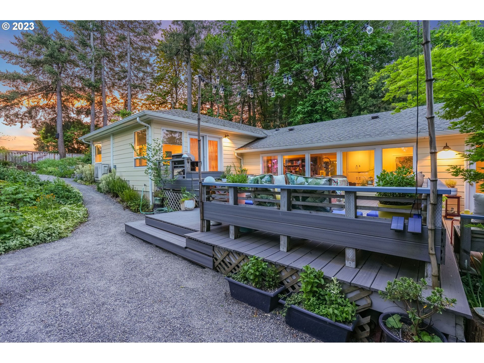 644 South Palatine Hill Road Portland, OR 97219 - Photo 34 of 46 a view of a house and a yard