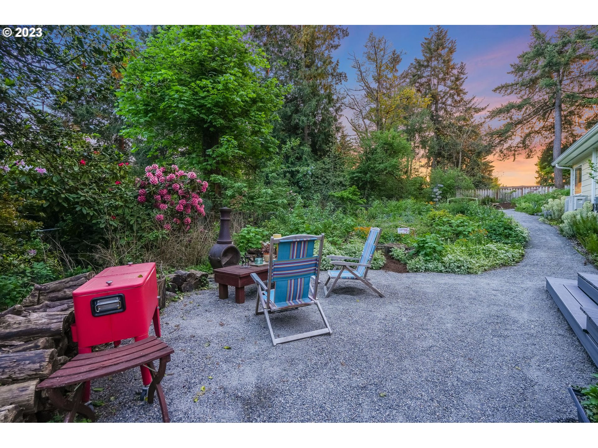 644 South Palatine Hill Road Portland, OR 97219 - Photo 36 of 46 a view of a bench in a garden