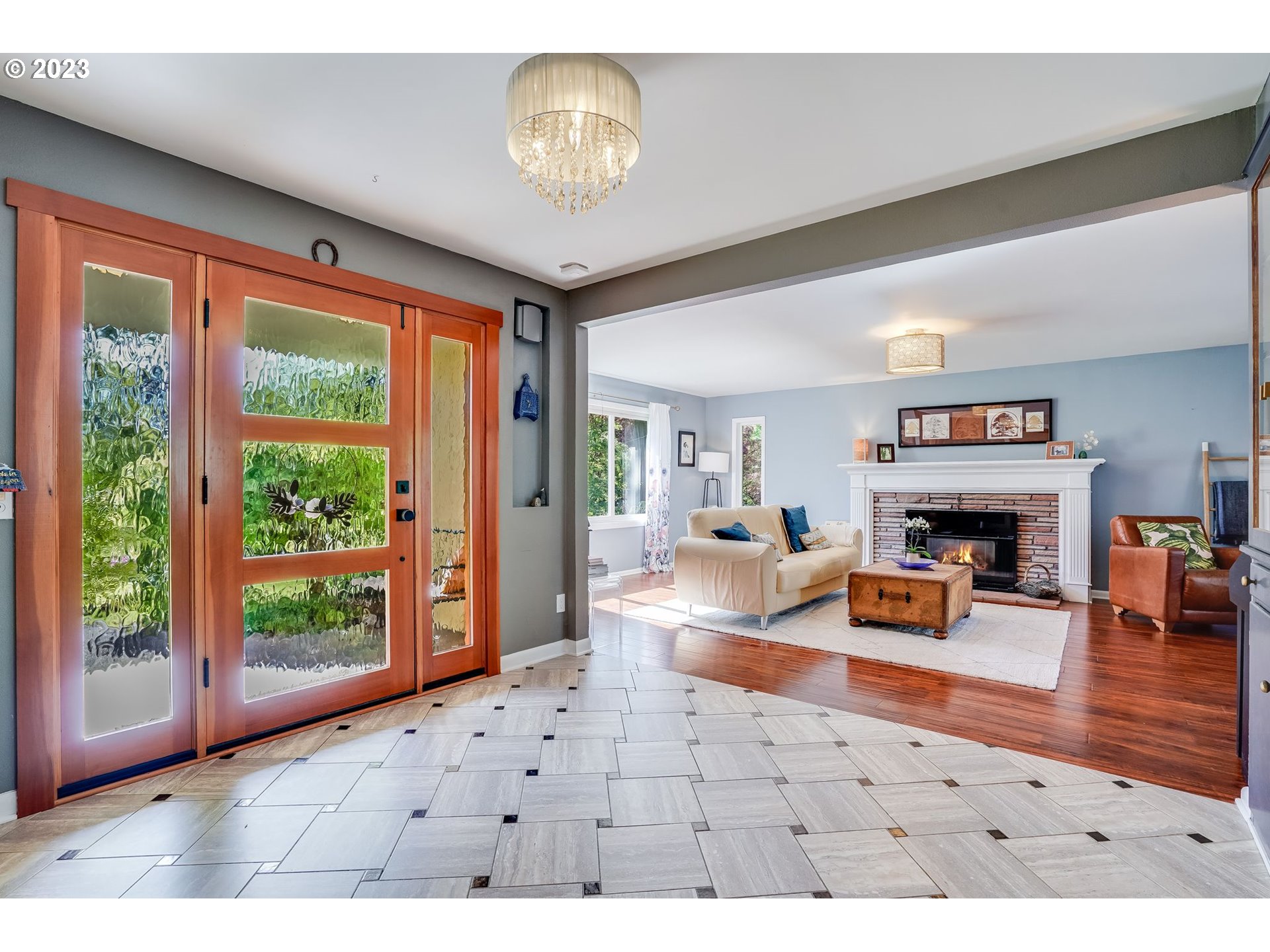 644 South Palatine Hill Road Portland, OR 97219 - Photo 4 of 46 a living room with furniture a rug and a large window