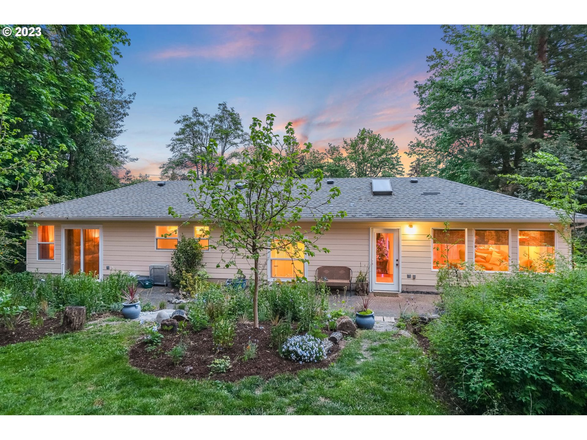 644 South Palatine Hill Road Portland, OR 97219 - Photo 45 of 46 a view of a house with a yard