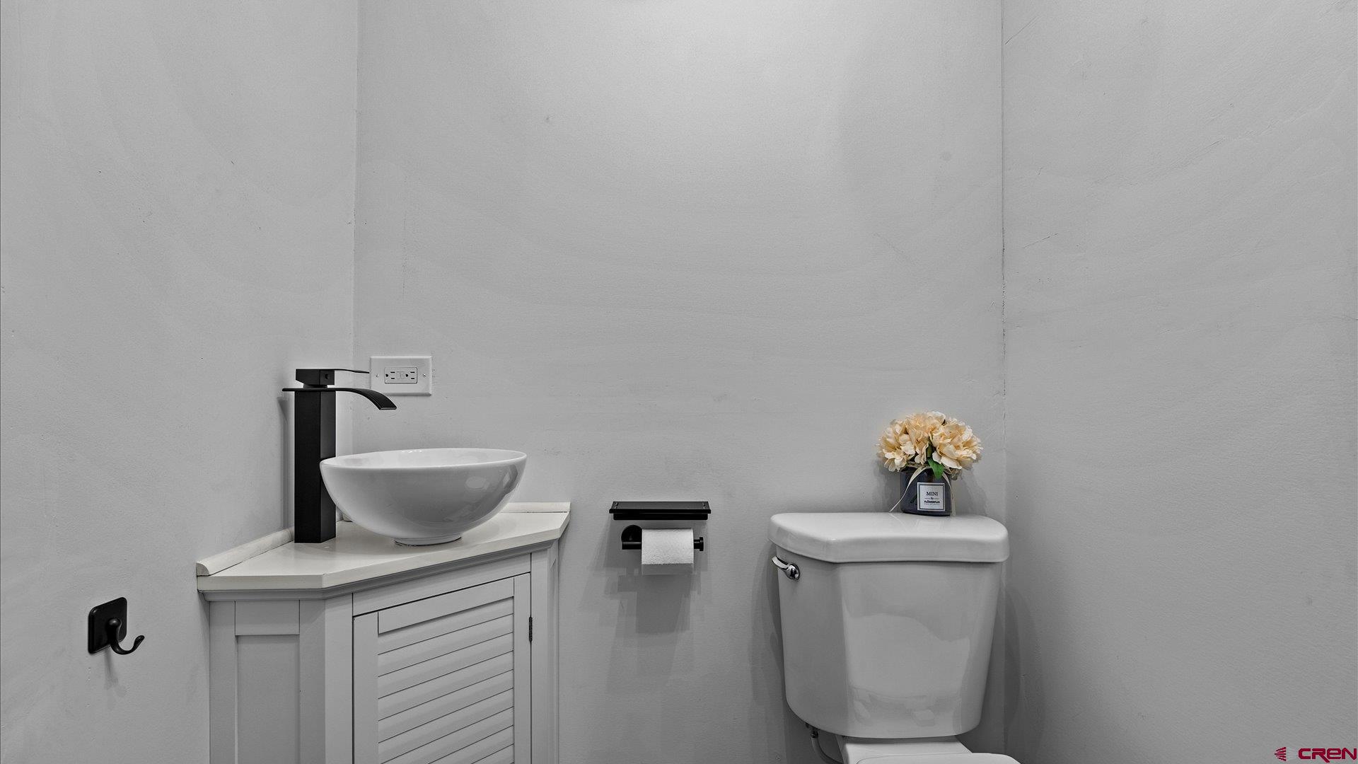 1761 G Road Delta, CO 81416 - Photo 23 of 43 a bathroom with a toilet and a sink