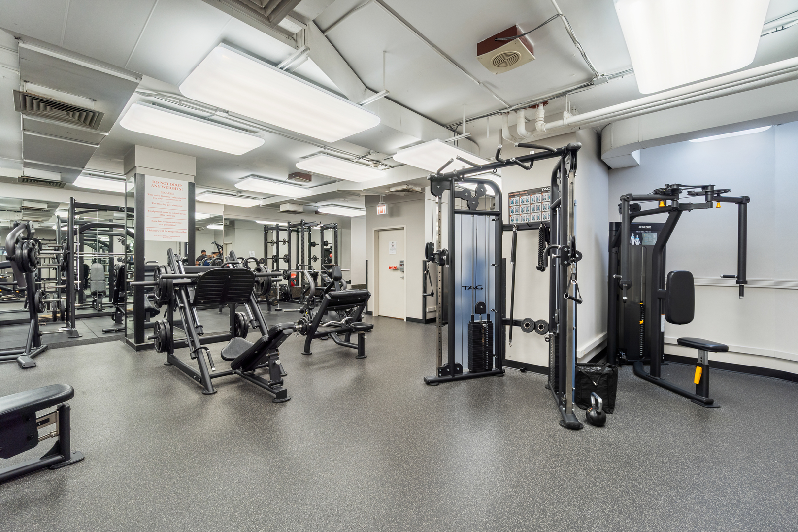 211 East Ohio Street, Unit 2806 Chicago, IL 60611 - Photo 13 of 16 a view of a room with gym equipment