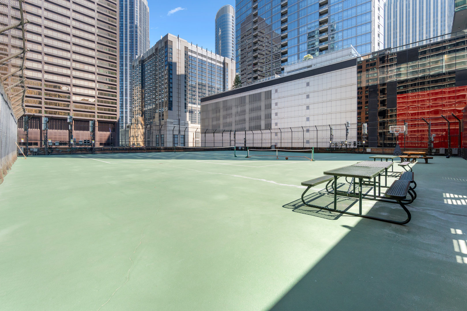 211 East Ohio Street, Unit 2806 Chicago, IL 60611 - Photo 14 of 16 a view of a swimming pool with chairs