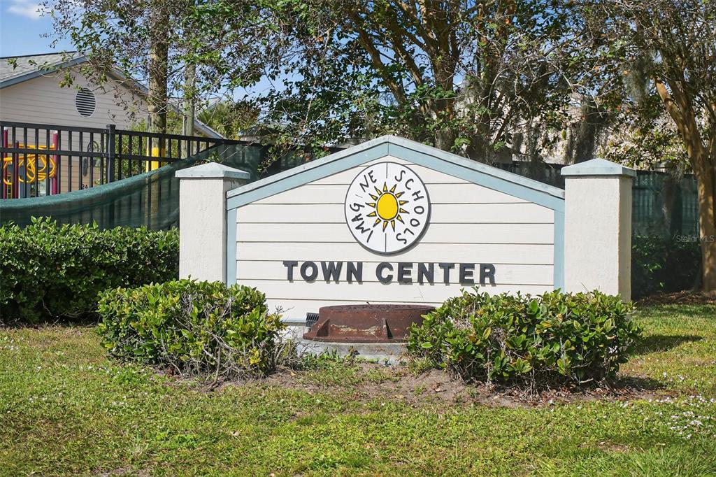 469 Bulldog Drive, Unit 1 Palm Coast, FL 32164 - Photo 17 of 54 a sign on the side of a building