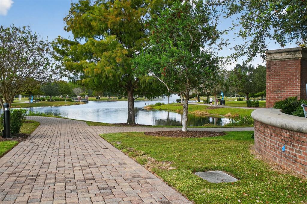 469 Bulldog Drive, Unit 1 Palm Coast, FL 32164 - Photo 23 of 54 a view of a swimming pool and a yard