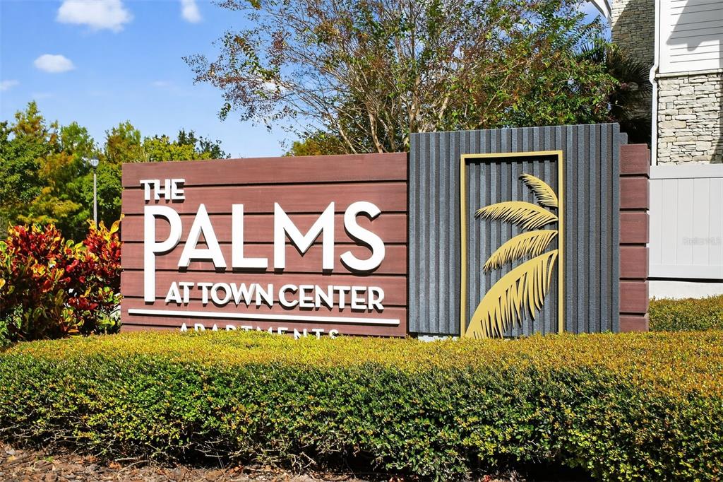 469 Bulldog Drive, Unit 1 Palm Coast, FL 32164 - Photo 37 of 54 a sign on the side of a building