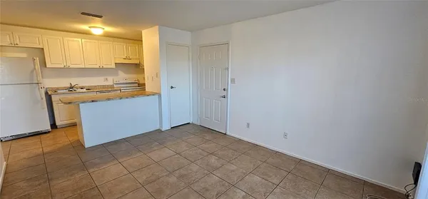 a view of a kitchen with a sink