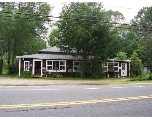 1042 Templeton Road Athol, MA 01331 - Photo 1 of 2 a front view of a house with a garden