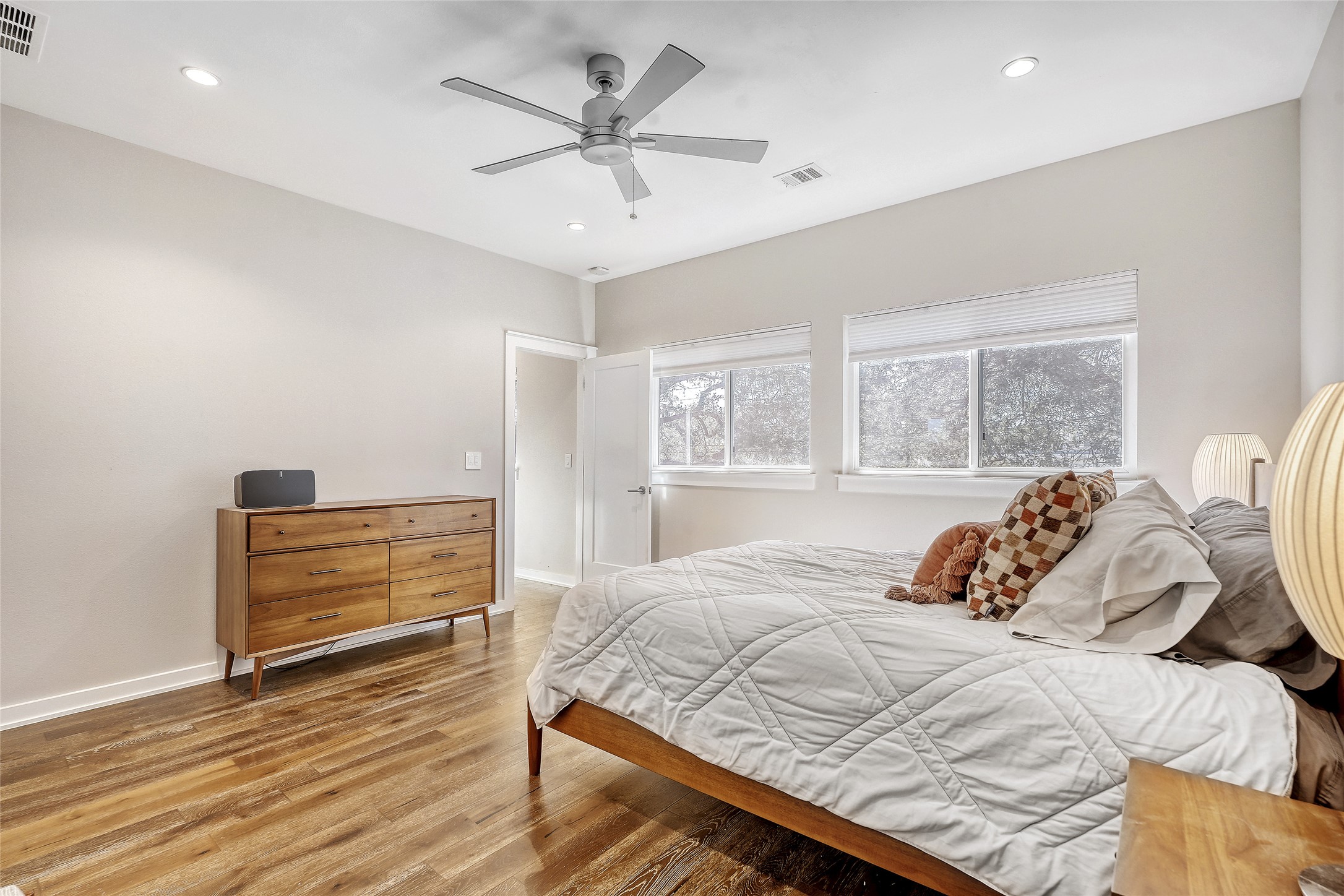 6800 Menchaca Road, Unit 5 Austin, TX 78745 - Photo 23 of 28 a bedroom with a bed and a window