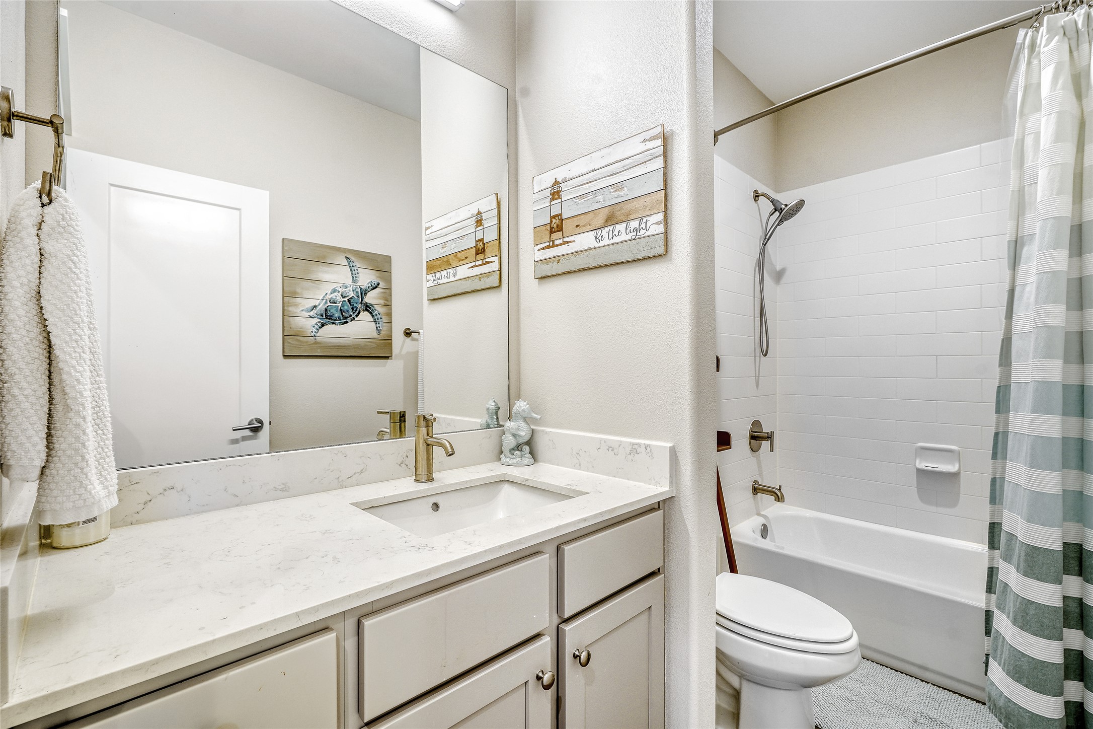 6800 Menchaca Road, Unit 5 Austin, TX 78745 - Photo 24 of 28 a bathroom with a sink toilet and shower