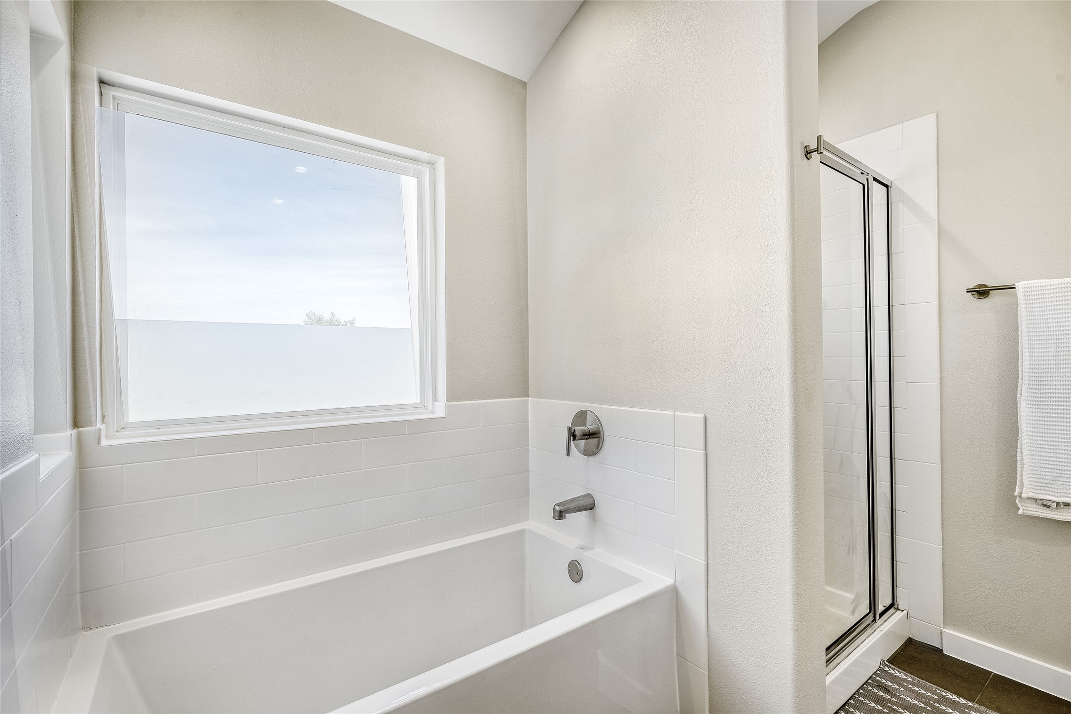 6800 Menchaca Road, Unit 5 Austin, TX 78745 - Photo 27 of 28 a white bath tub sitting next to a shower