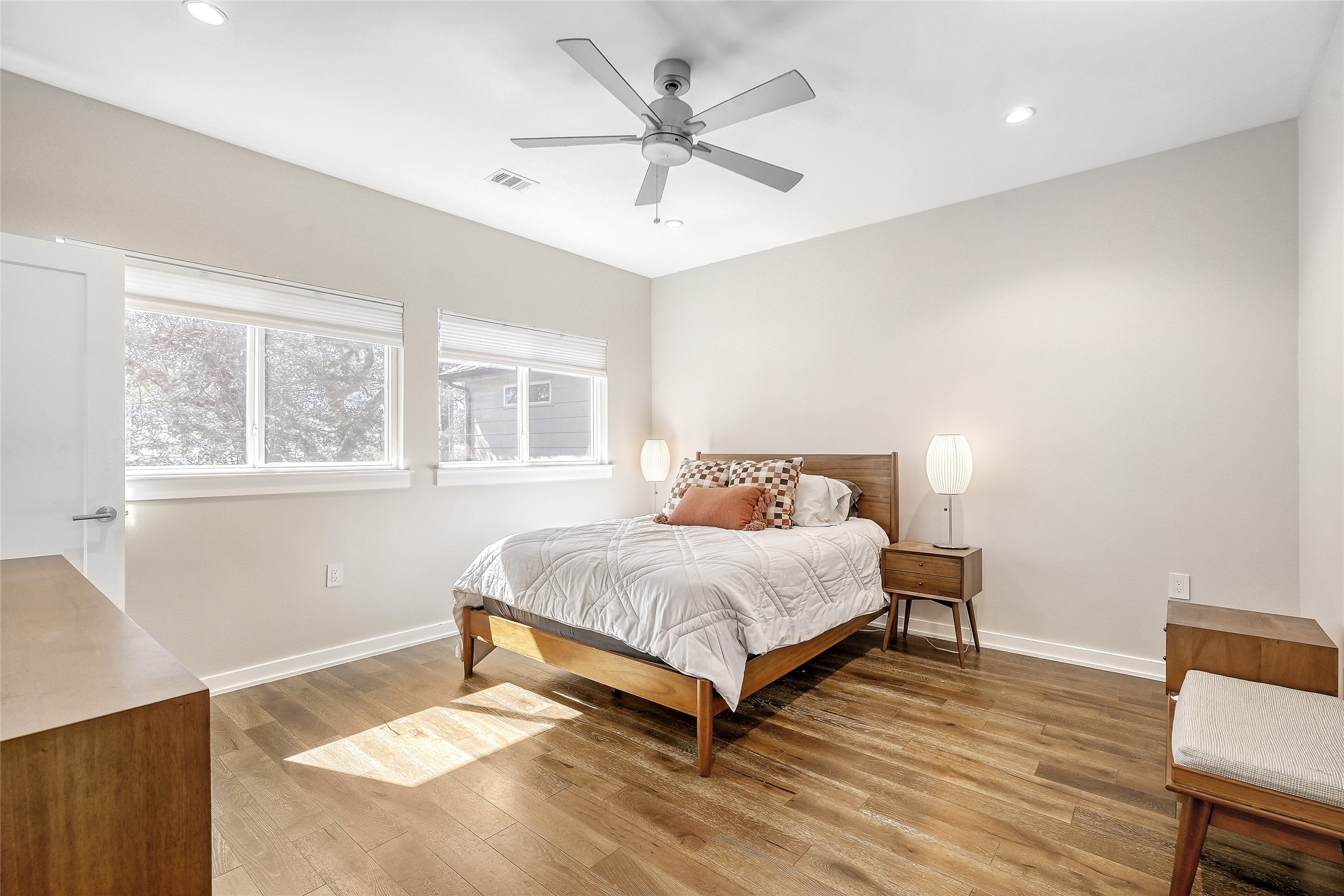 6800 Menchaca Road, Unit 5 Austin, TX 78745 - Photo 3 of 28 a bedroom with a bed and window