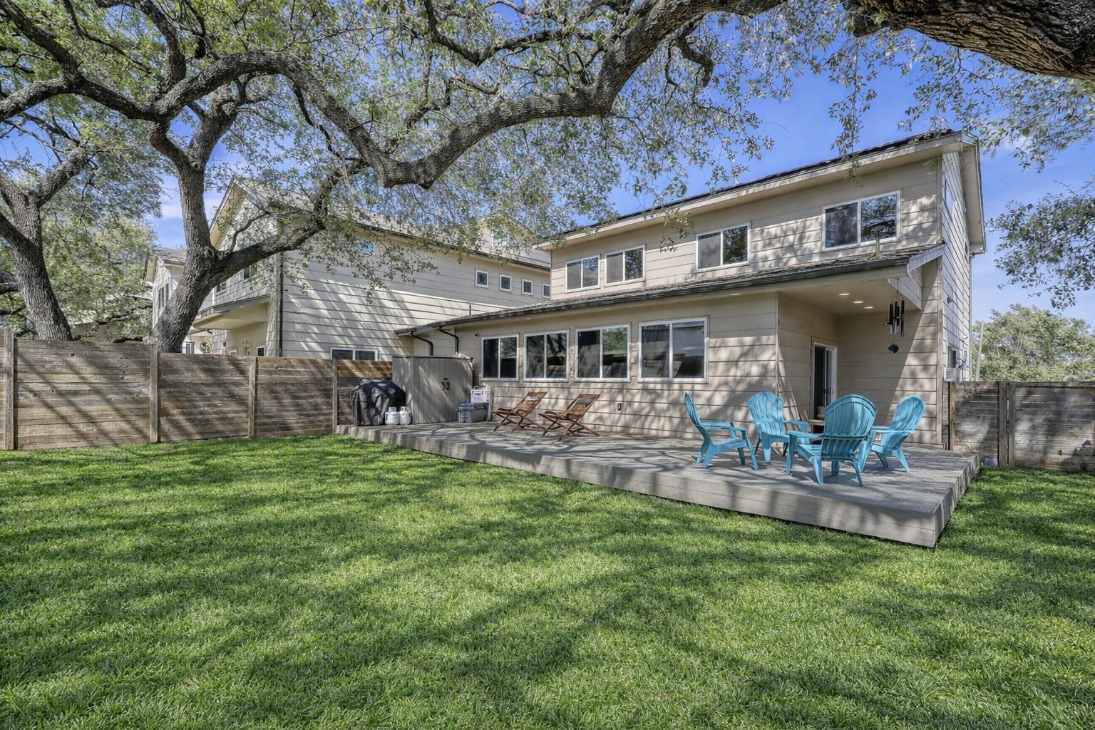 6800 Menchaca Road, Unit 5 Austin, TX 78745 - Photo 6 of 28 a view of a house with a yard porch and sitting area
