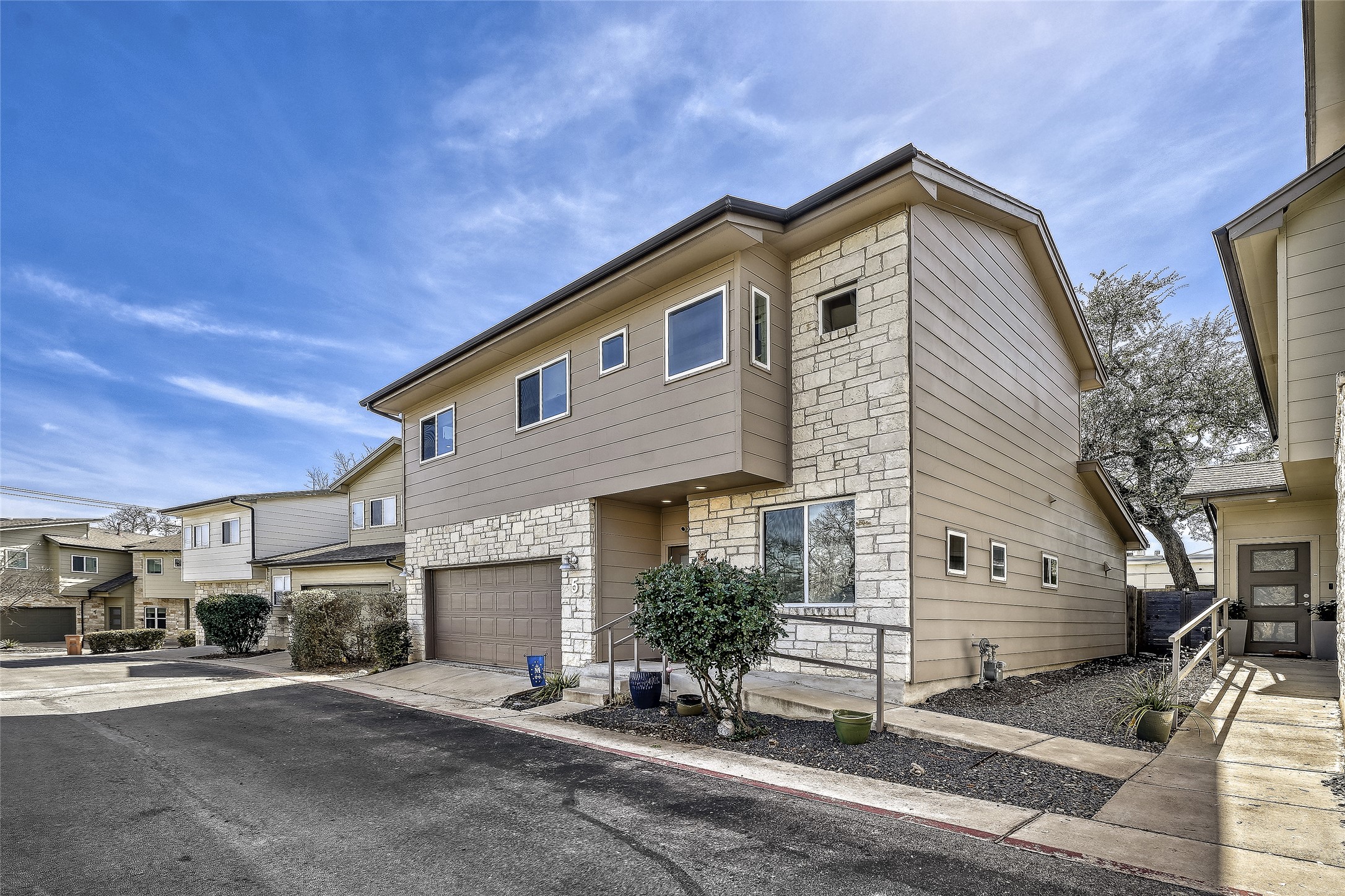 6800 Menchaca Road, Unit 5 Austin, TX 78745 - Photo 7 of 28 a view of a house with a street