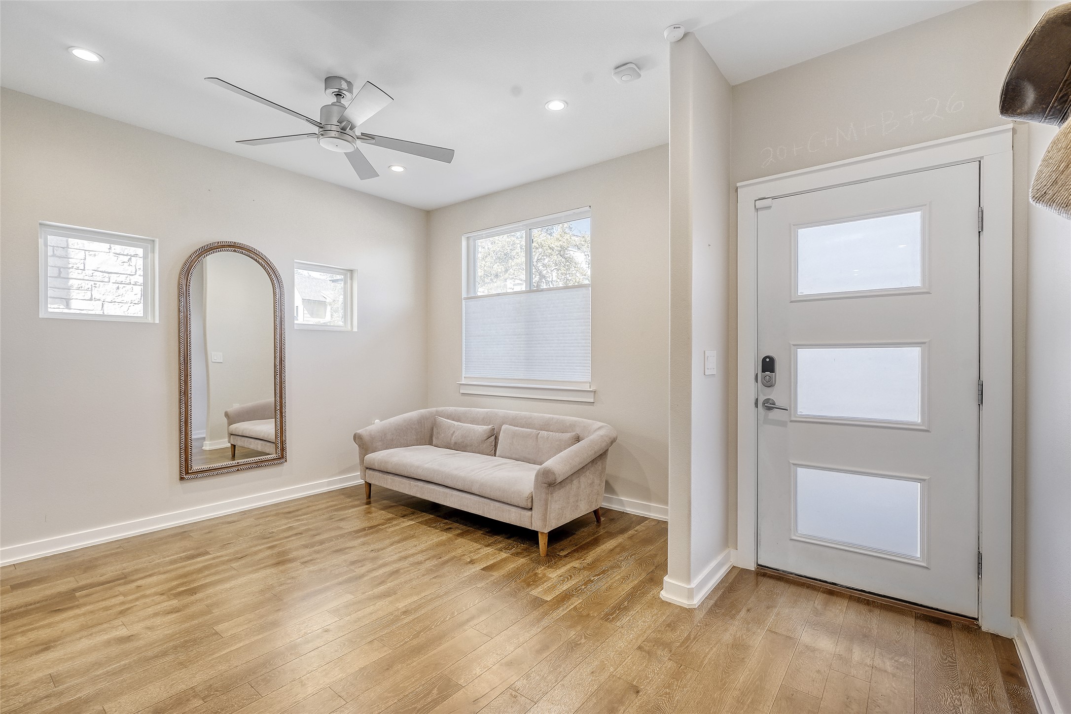 6800 Menchaca Road, Unit 5 Austin, TX 78745 - Photo 9 of 28 a living room with furniture and a window